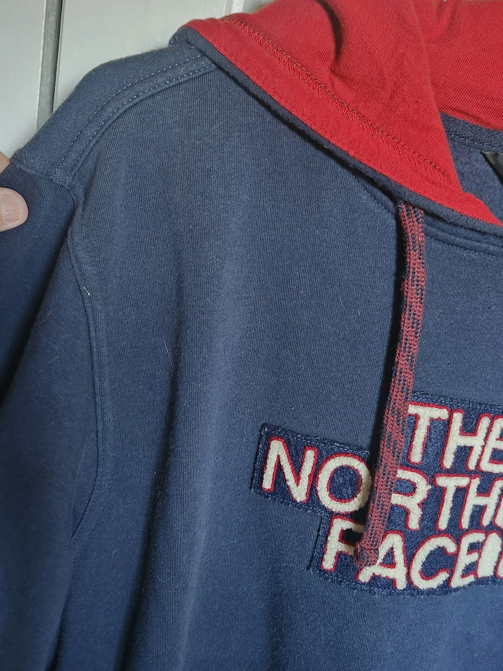 The North Face Navy Pullover Hoodie with Red Lined Hood